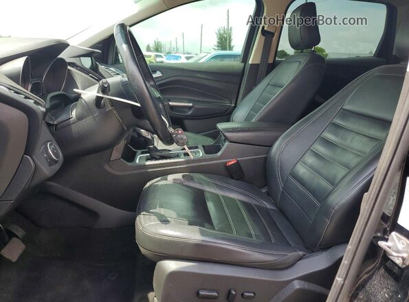 1FMCU9HD4JUD53666 2018 FORD ESCAPE Black Front interior view