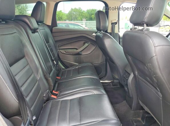 1FMCU9HD4JUD53666 2018 FORD ESCAPE Black Rear seats view
