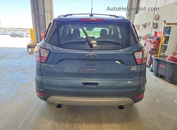 1FMCU9HD5JUC59635 2018 FORD ESCAPE Синий Вид сзади