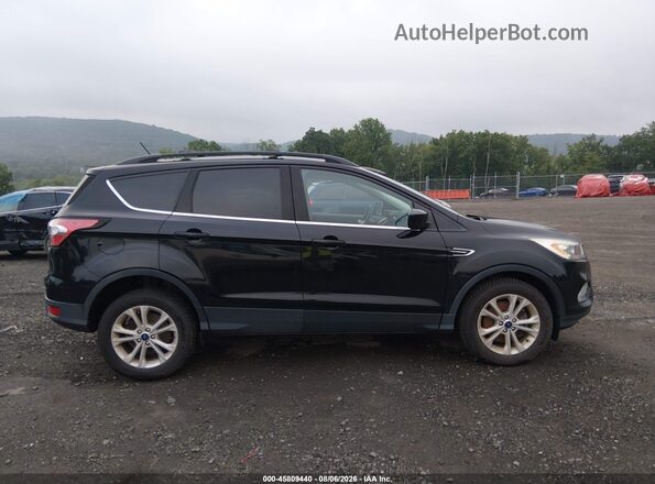 1FMCU9HD7JUB34040 2018 FORD ESCAPE Black Widok wnętrza z tyłu