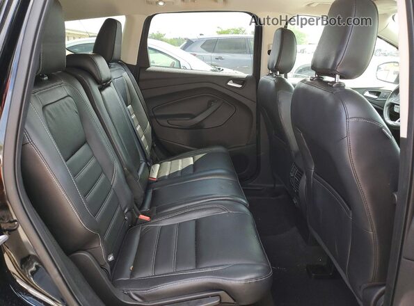 1FMCU9HD7JUC16236 2018 FORD ESCAPE Black Widok wnętrza z tyłu