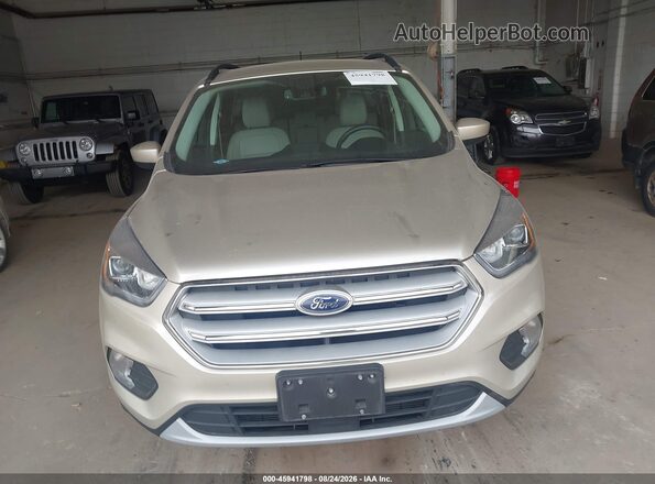1FMCU9HD7JUC78090 2018 FORD ESCAPE Tan ხელსაწყოთა პანელის ხედი