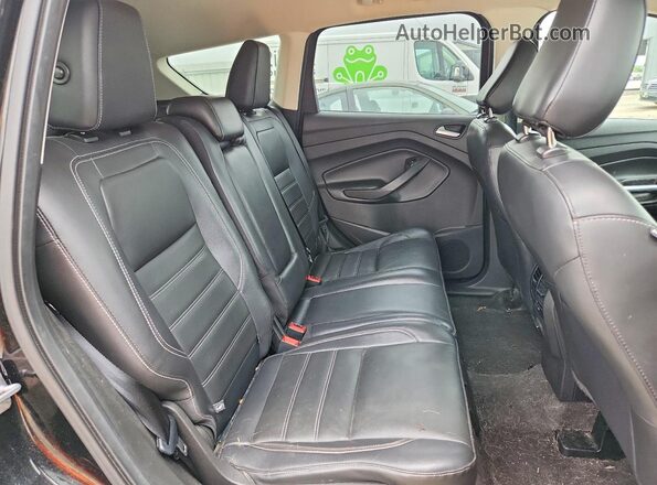 1FMCU9HD8JUB86714 2018 FORD ESCAPE Black Rear seats view