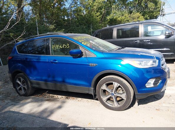 1FMCU9HD8JUD34957 2018 FORD ESCAPE Blue Rear interior view