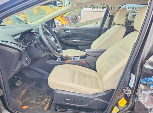 1FMCU9HD9JUD36278 2018 FORD ESCAPE Black Front interior view