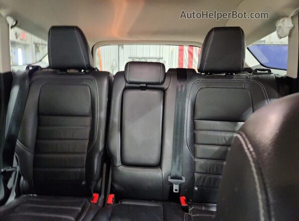 1FMCU9J90HUE10087 2017 FORD ESCAPE Tan Rear seats view