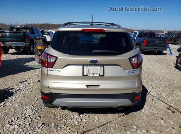 1FMCU9J94HUE62662 2017 FORD ESCAPE Желто-коричневый Вид сзади