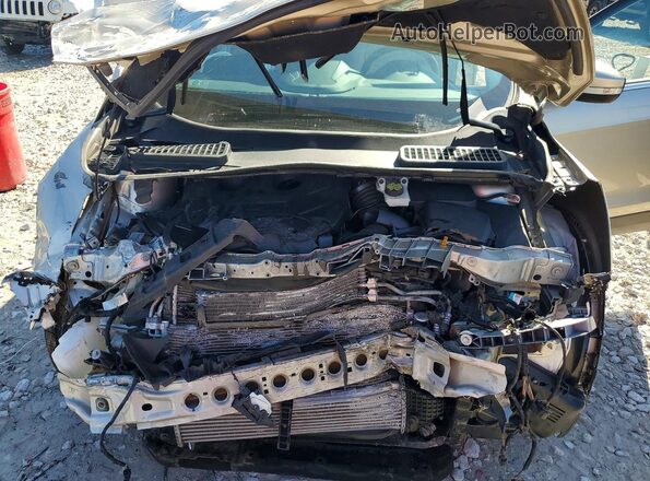 1FMCU9J94HUE62662 2017 FORD ESCAPE Желто-коричневый Вид задней части салона