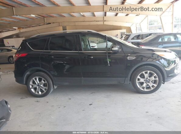 1FMCU9J96GUC68052 2016 FORD ESCAPE Black Widok wnętrza z tyłu