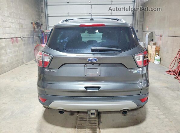 1FMCU9J97HUB33454 2017 FORD ESCAPE Серый Вид сзади