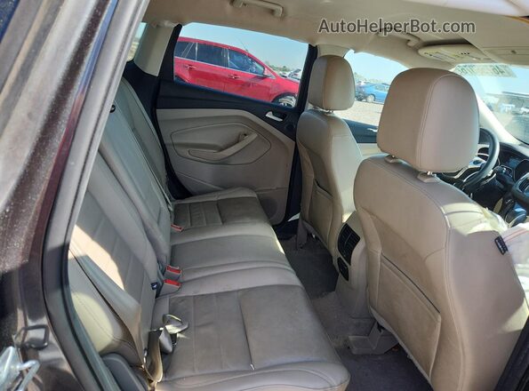 1FMCU9J98GUB03524 2016 FORD ESCAPE Gray Вид задньої частини салону
