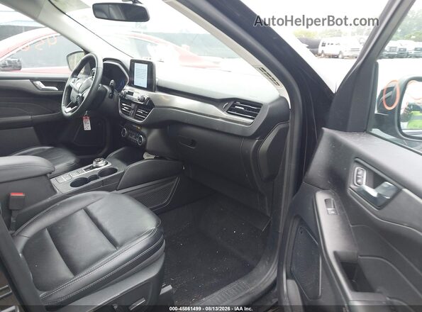1FMCU9J98MUA70262 2021 FORD ESCAPE Черный Вид салона спереди