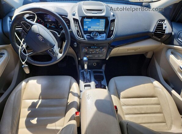 1FMCU9JD0HUE62291 2017 FORD ESCAPE Бежевый Вид панели приборов