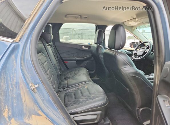 1FMCU9JZ1RUB08941 2024 FORD ESCAPE Синий Вид задней части салона