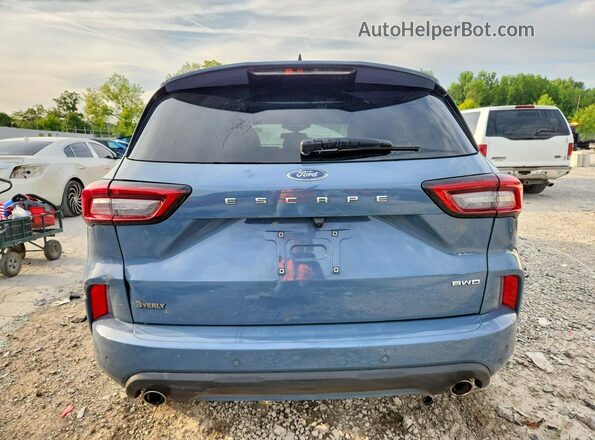 1FMCU9MNXPUB46514 2023 FORD ESCAPE Gray Vista trasera