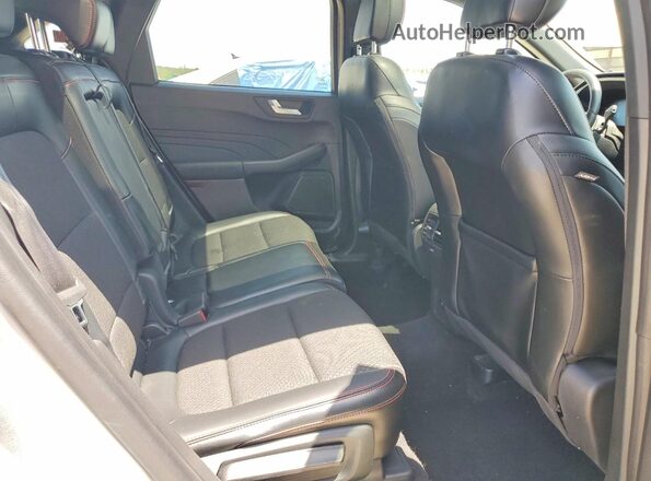 1FMCU9MNXRUA34492 2024 FORD ESCAPE Серебряный Вид задней части салона