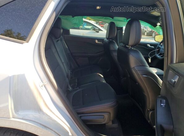 1FMCU9PZXSUB11303 2025 FORD ESCAPE Silver Widok wnętrza z tyłu