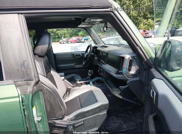 1FMDE5BHXPLB32576 2023 FORD BRONCO Green Front interior view