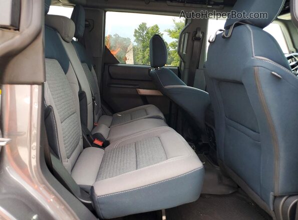 1FMDE5DHXPLB21932 2023 FORD BRONCO Gray Widok wnętrza z tyłu