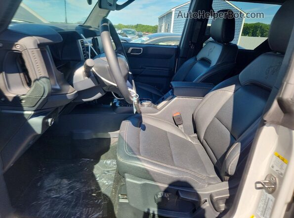 1FMDE7BH0TLA85970 2026 FORD BRONCO Gray Vista interior delantera