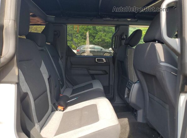 1FMDE7BH4TLA61445 2026 FORD BRONCO Gray Vista de los asientos traseros
