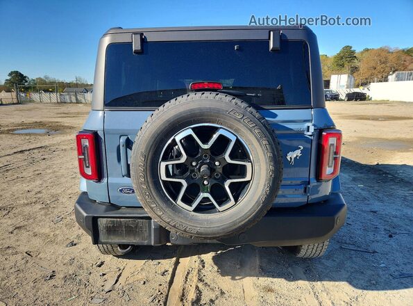 1FMDE8BH7RLB14752 2024 FORD BRONCO Blue უკანა ხედი