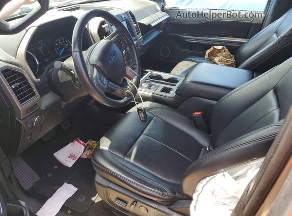 1FMJK1HTXLEA96676 2020 FORD EXPEDITION Silver Front interior view