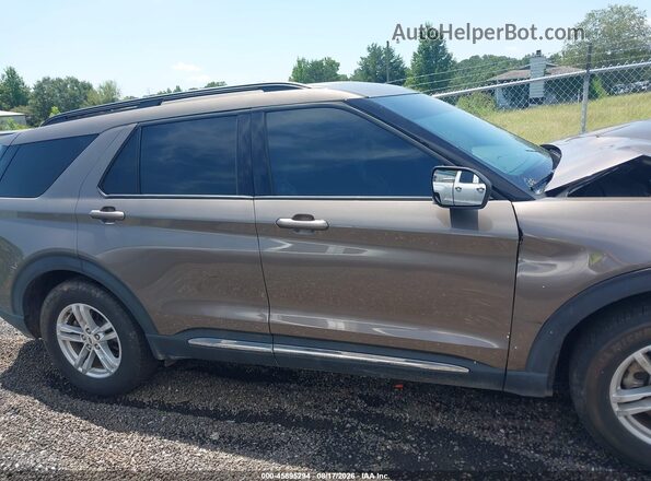1FMSK7DH6MGB48948 2021 FORD EXPLORER Brown Vista interior trasera