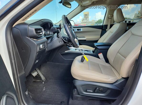 1FMSK7FH6MGA92006 2021 FORD EXPLORER Gray Vista interior delantera