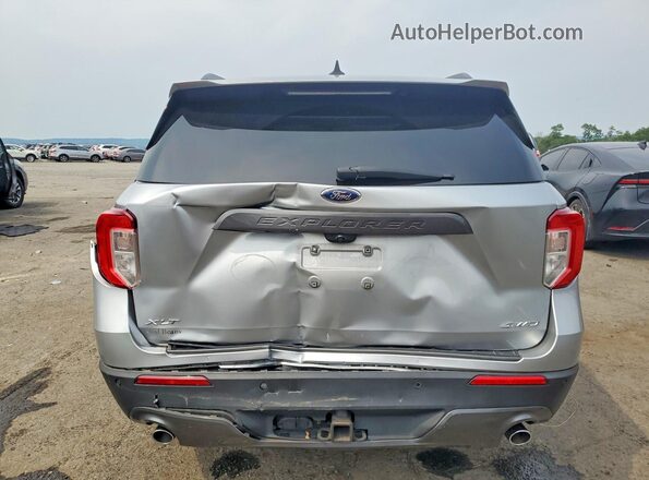 1FMSK8DH0NGC16247 2022 FORD EXPLORER Gray Vista trasera