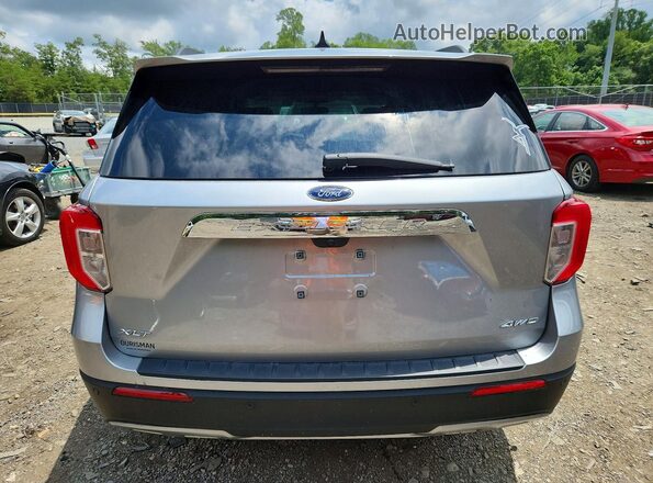 1FMSK8DH2PGC24496 2023 FORD EXPLORER Silver Rear view
