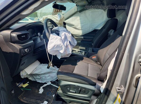 1FMSK8DH4PGC39355 2023 FORD EXPLORER Silver Front interior view