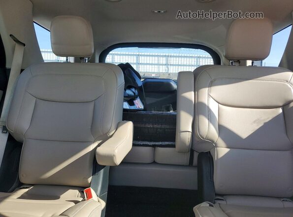 1FMSK8DH5MGC32216 2021 FORD EXPLORER White Rear seats view