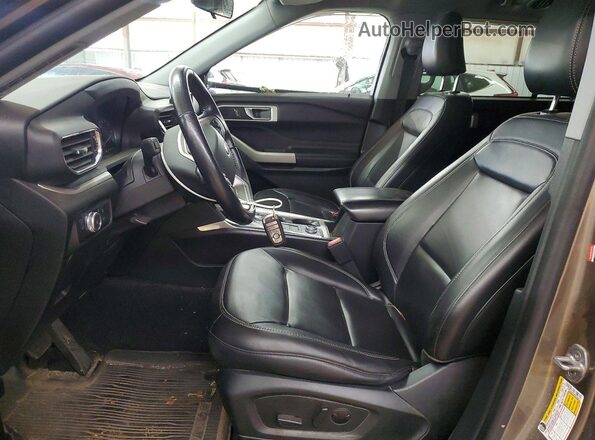 1FMSK8DH9MGC05875 2021 FORD EXPLORER Brown Vista interior delantera