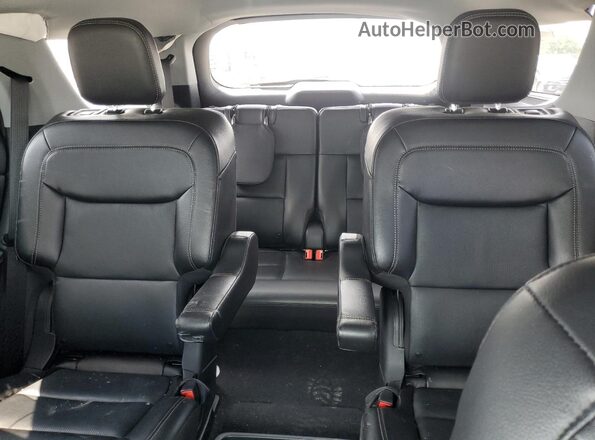 1FMSK8FH4MGB04126 2021 FORD EXPLORER White Vista de los asientos traseros