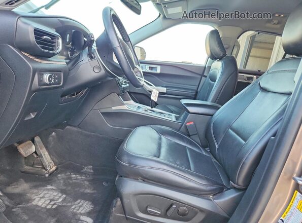 1FMSK8FH9MGA21033 2021 FORD EXPLORER Brown Vista interior delantera