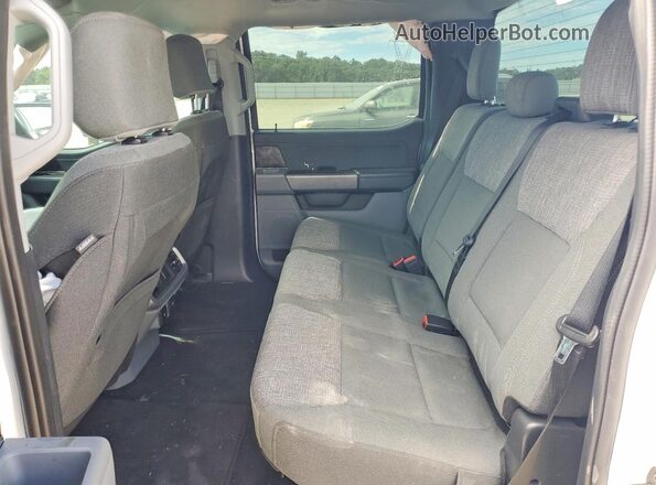 1FT6W1EV0PWG64082 2023 FORD F150 White Vista de los asientos traseros