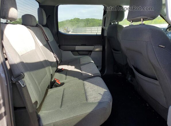 1FTEW1C82PKD44178 2023 FORD F150 Gray Vista de los asientos traseros