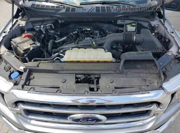 1FTEW1CP5PKD57420 2023 FORD F150 Silver Vista interior trasera