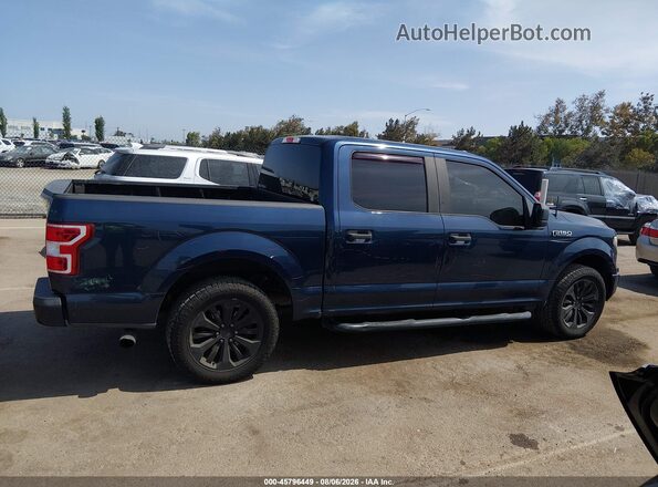 1FTEW1CP7JFA05729 2018 FORD F150 Dark Blue Vista interior trasera