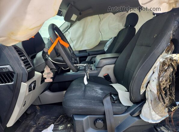 1FTEW1CP7JKD04760 2018 FORD F150 Silver Front interior view