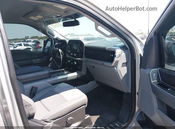 1FTEW1CP9PKF90460 2023 FORD F150 Серебряный Вид салона спереди