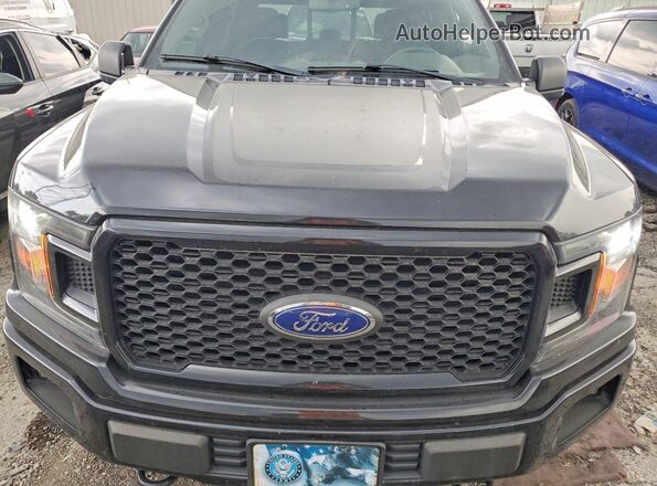 1FTEW1E53JFC41287 2018 FORD F150 Black Vista interior trasera