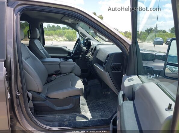 1FTEW1E57JFD05119 2018 FORD F150 Brown Widok wnętrza z przodu