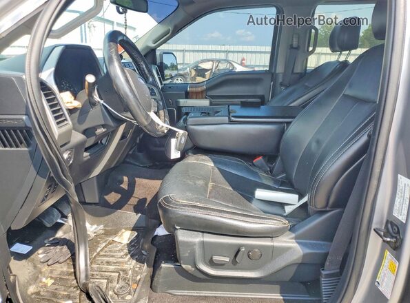 1FTEW1E57LFA20617 2020 FORD F150 Серебряный Вид салона спереди