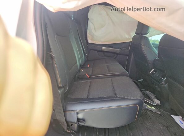 1FTEW1E82PFC16674 2023 FORD F150 White Widok tylnych siedzeń