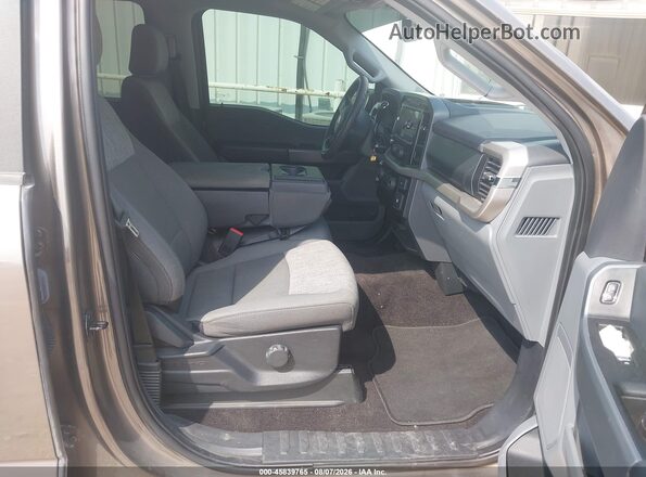 1FTEW1EB4MFC52549 2021 FORD F150 Brown Вид салону спереду