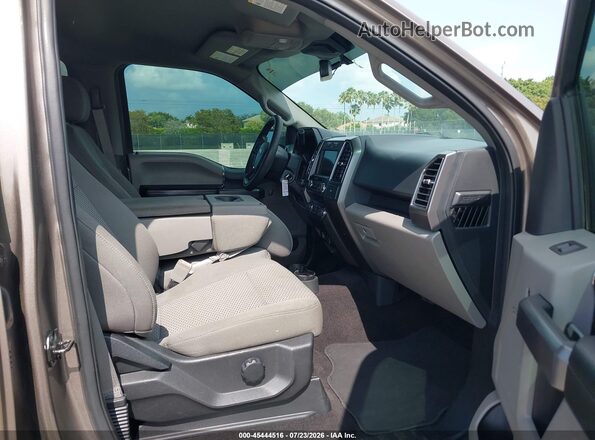 1FTEW1EB8KKD65568 2019 FORD F150 Brown Widok wnętrza z przodu