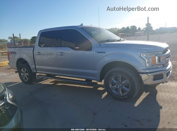 1FTEW1EG6JKC22936 2018 FORD F150 Серебряный Вид задней части салона