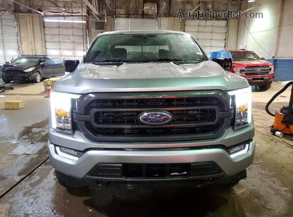 1FTEW1EP0PFD32298 2023 FORD F150 Silver Front view
